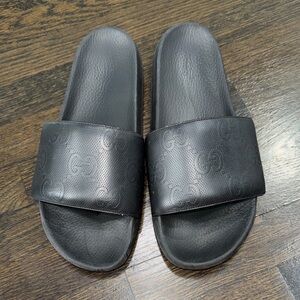Men's Black Gucci Sandals with Embossed Logo